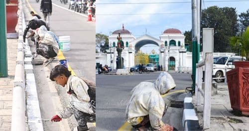 सिंहदरबार क्षेत्रमा सडक रङरोगन गरिँदै
