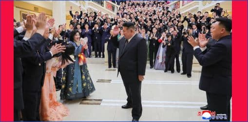 Respected Comrade Kim Jong Un Has Photos Taken with Creative Workers and Artistes of National Symphony Orchestra Greeting Its 80th Founding Anniversary